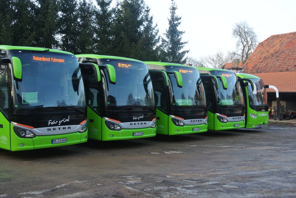 FlixBus on highway during sunset